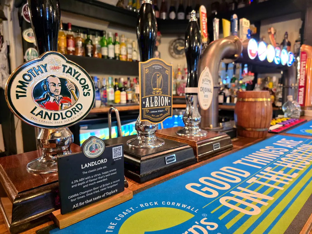 Hand pumps on the bar for the cask ales